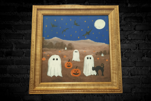 Framed landscape painting with ghosts and pumpkins