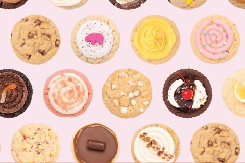 Variety of cookies on pale pink background