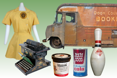 Assortment of objects from the history of Wisconsin, including a can of Jolly Good soda and the Door County Bookmobile.