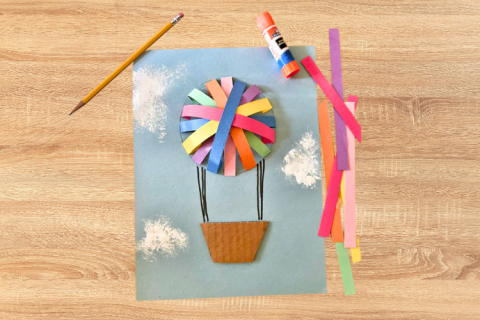 Picture of a hot-air balloon made with strips of colorful paper
