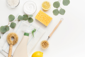 selection of cleaning supplies in shades of yellow and green