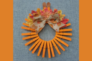 Pumpkin wreath made from clothespins