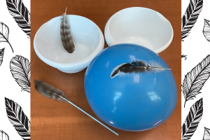 Three feathers on balloons and bowls