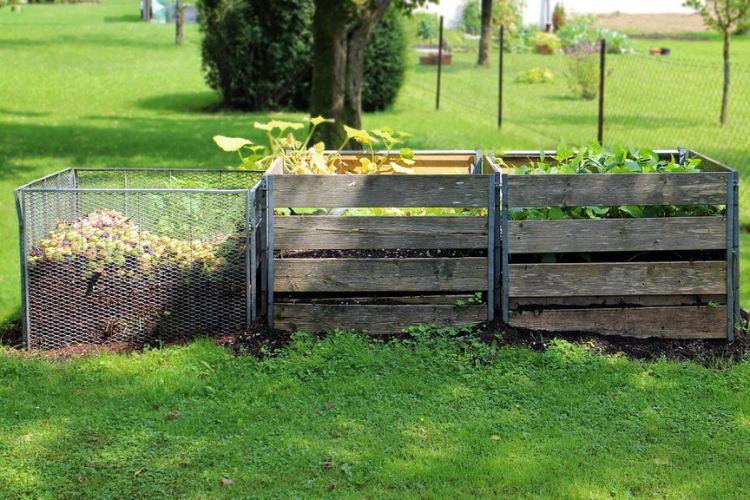 Raised garden beds and compost soil.