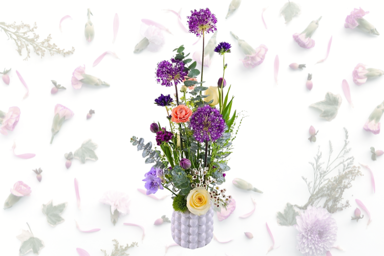 Tall floral arrangement in a squat vase